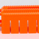 Illustration for article titled This Clip-on Handgun Attachment Makes Bullets Non-Lethal